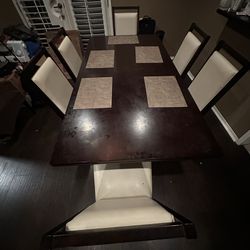 Dining room table with chairs