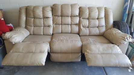 FREE reclining leather sofa.
