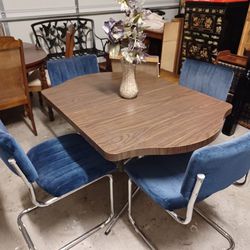 MCM 4 Segars Tubular Cantilevered Chrome Blue Velvet Dining Chairs and a Table