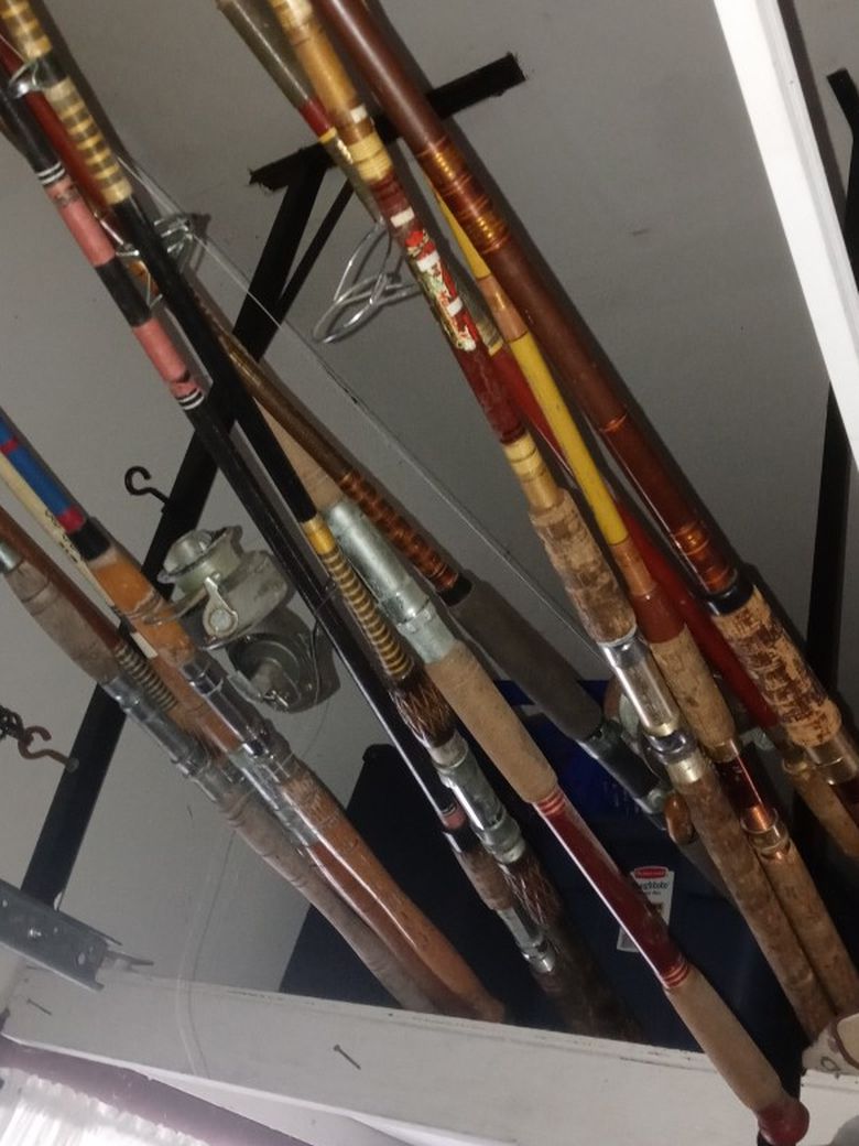 Old Fishing Poles And Asorted Tackle