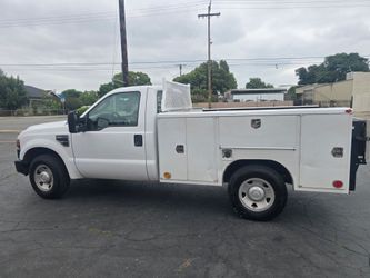 2008 ford F-250  5.4 v8 utility bed with liftgate only 78k original milles just smog cold ac clean title one owner reg current located in pomona 9o923