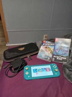 Nintendo Switch Lite w/ Charger, Case, And 2 Games