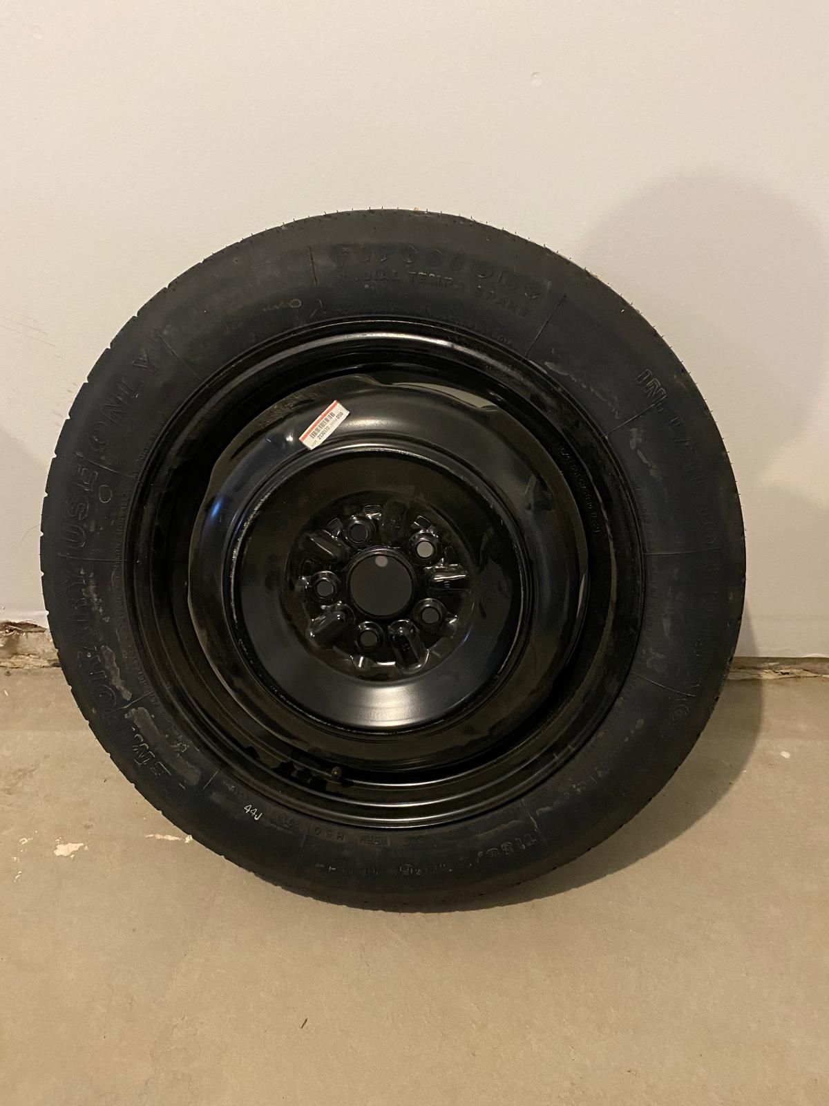 toyota corolla t135/80r16 spare tire new original