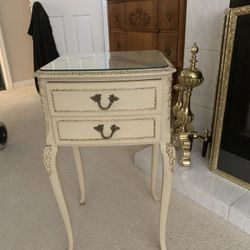 A pair or two vintage side tables with. Matching mirrors. They are beautiful and very nice solid condition