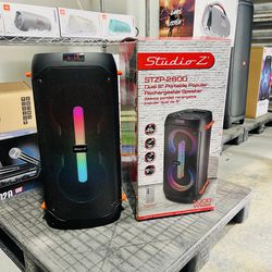 Studio Z portable rechargeable speaker. Bluetooth, USB/SD card, and FM radio. Remote control included. LED lights. 
