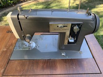 Kenmore sewing machine with cabinet