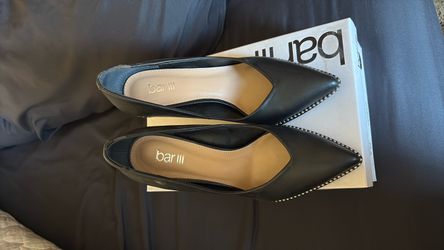 Woman’s black heels
