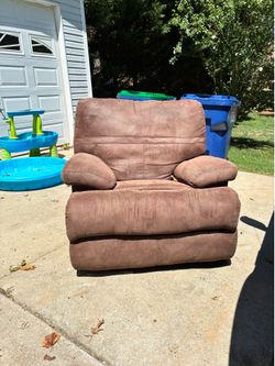 Overstuffed chair lazy boy style rocking recliner