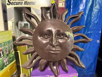 Bronze sun face garden hose hanger
