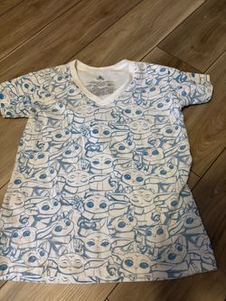Disney Star Wars shirt features an all-over blue doodle print of Grogu