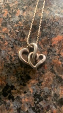 Metal Smith double heart 925 with small diamond chip nice piece