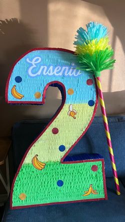 Curious George theme number pinata