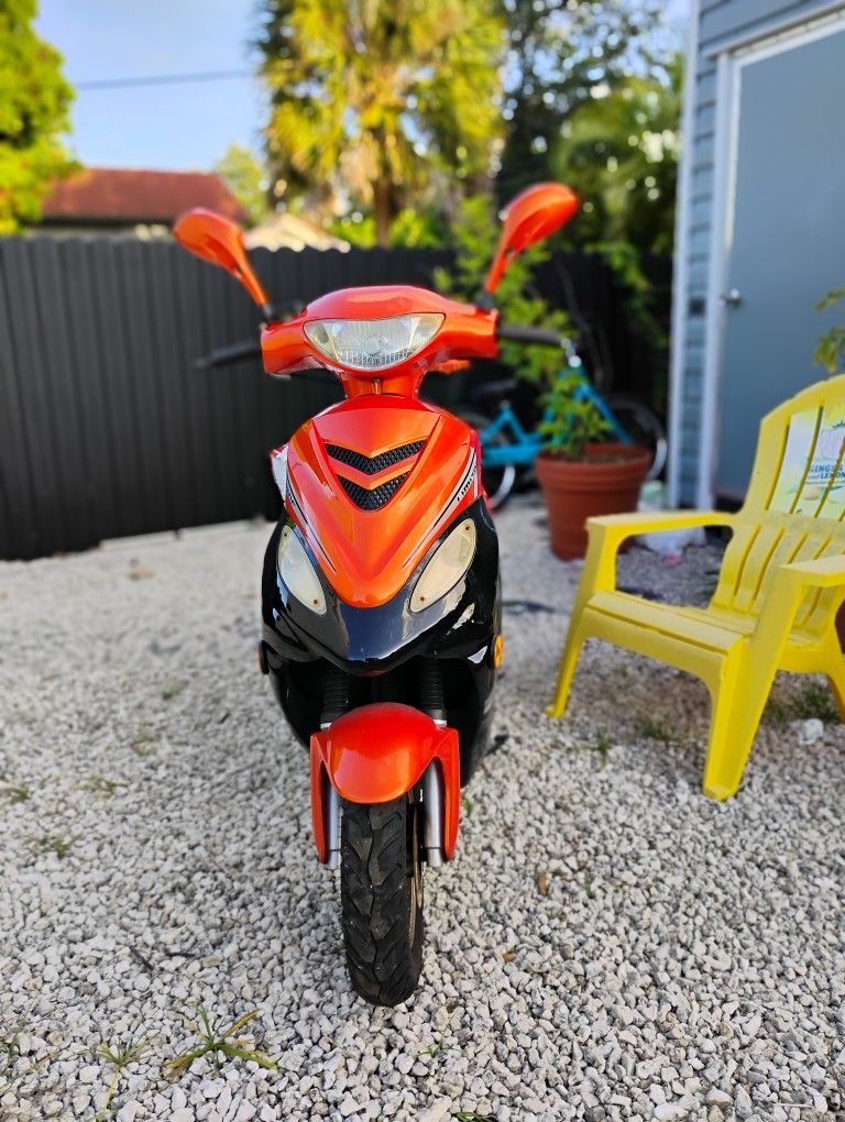2024 Orange And BlackSolana Scooter
