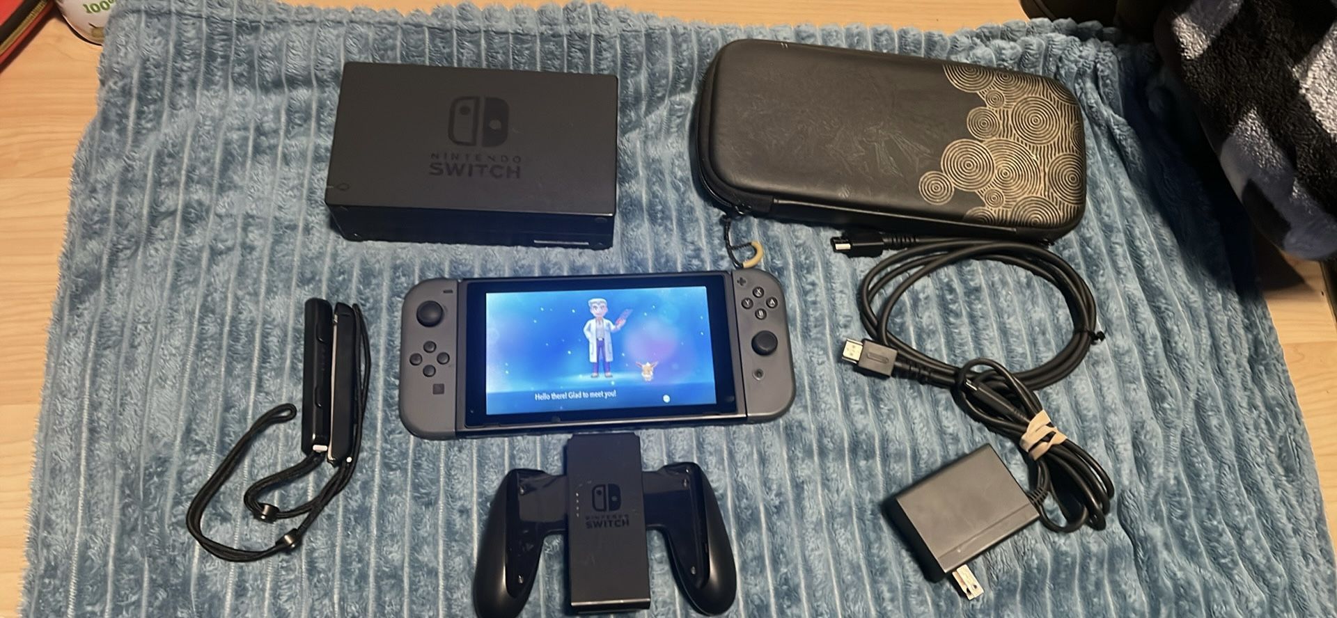 NINTENDO SWITCH WITH EVEE EVOLUTION, 256GIG MEMORY CARD, DOCKING STATION AND CASE