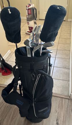 A set of overdrive golf clubs still good shape look at the photos closely please