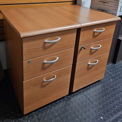 Selling two (2) wood cabinet with 3 storage drawer