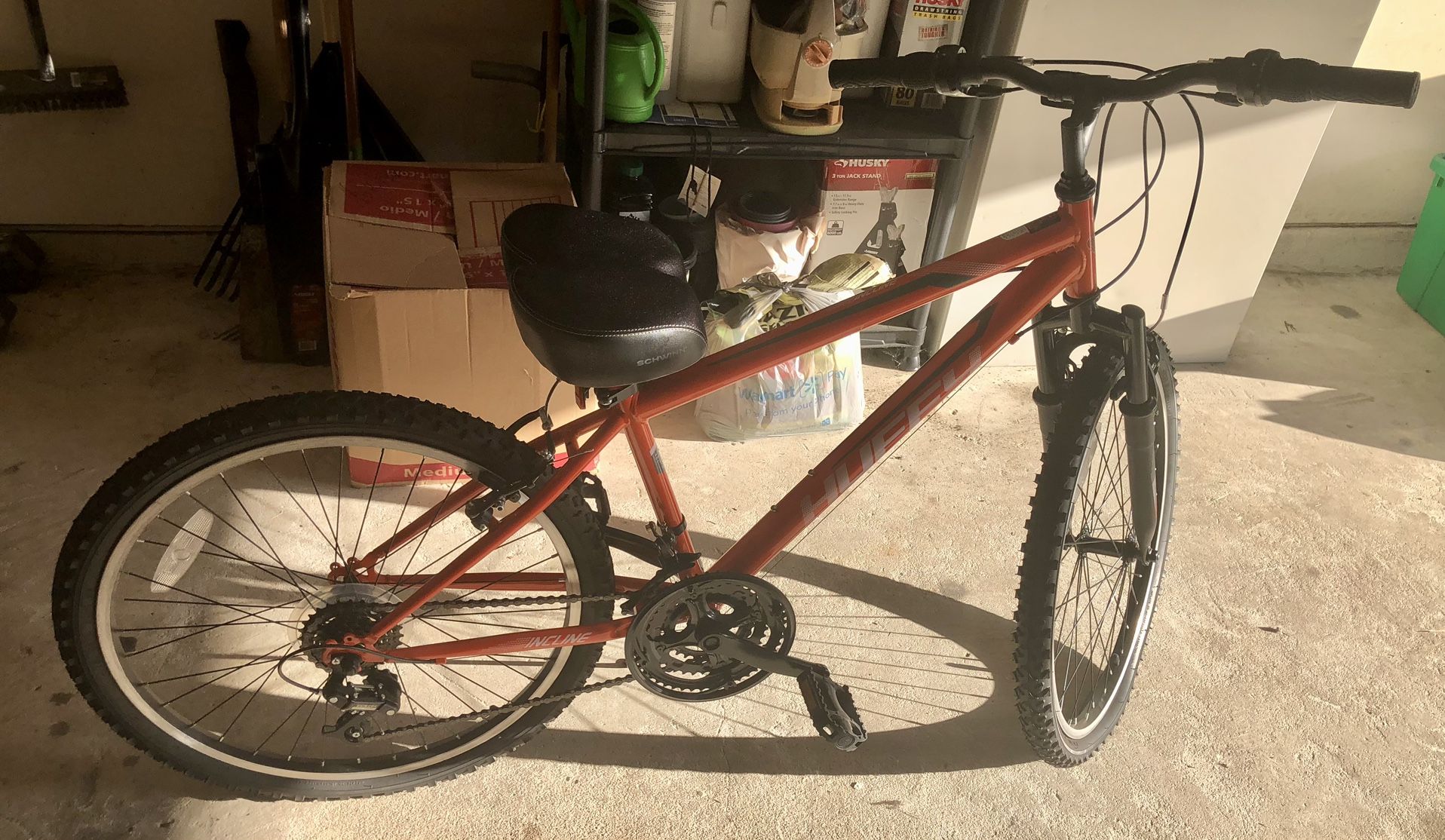Orange HUFFY 24 inch Incline Mountain Bike