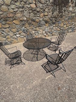 Antique patio set, very heavy weight, rocking chairs with big table, sell as is, $380 no less. West 79912