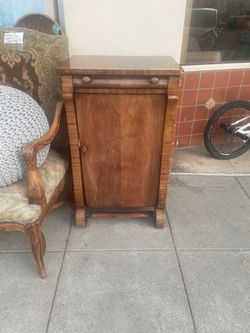 Antique music cabinet chest 21 by 16 by 36 chip on corner