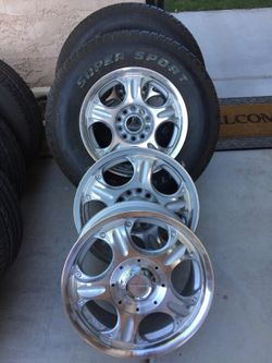 The set of four wheels and two tires. $250.00