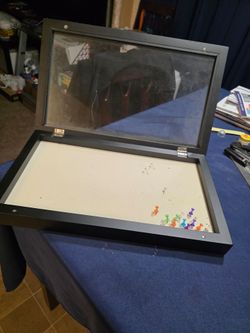 Memorabilia Cabitnet wall frame.