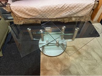 Modern swivel glass coffee table