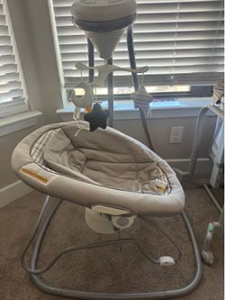 Baby swing and bassinet