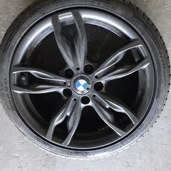 2016 BMW 235 I front OEM rim and tire good condition