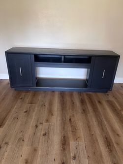 Living spaces wood entertainment center
