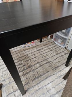 Table /2 black chairs.