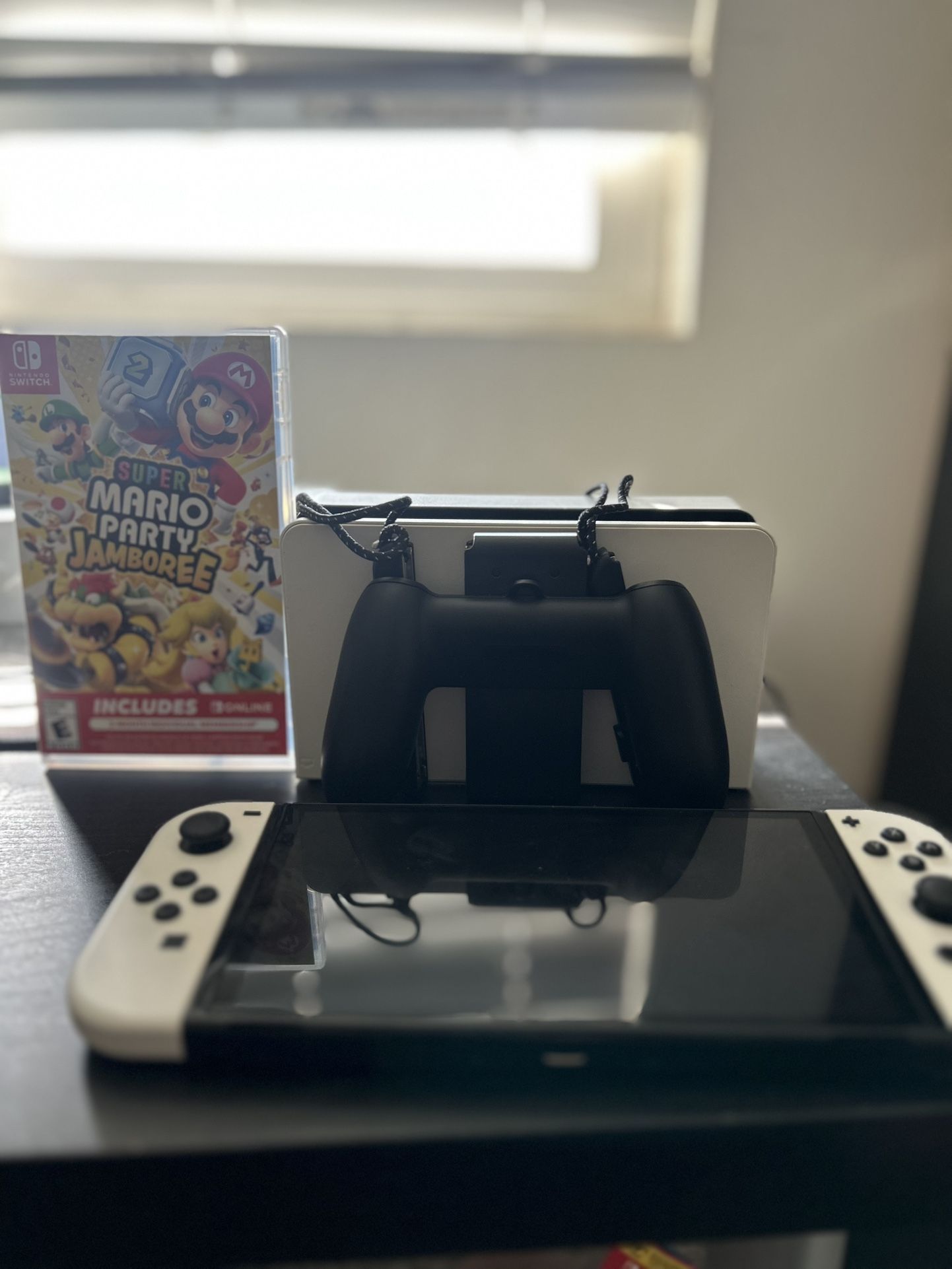 Nintendo switch Oled barley used with new mario party and mario kart.