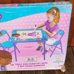 NEW IN BOX DISNEY DOC MCSTUFFINS TABLE AND CHAIRS WITH 3 DRY ERASER MARKERS.  PICK UP MIDDLEBORO ONLY FINAL SALE 