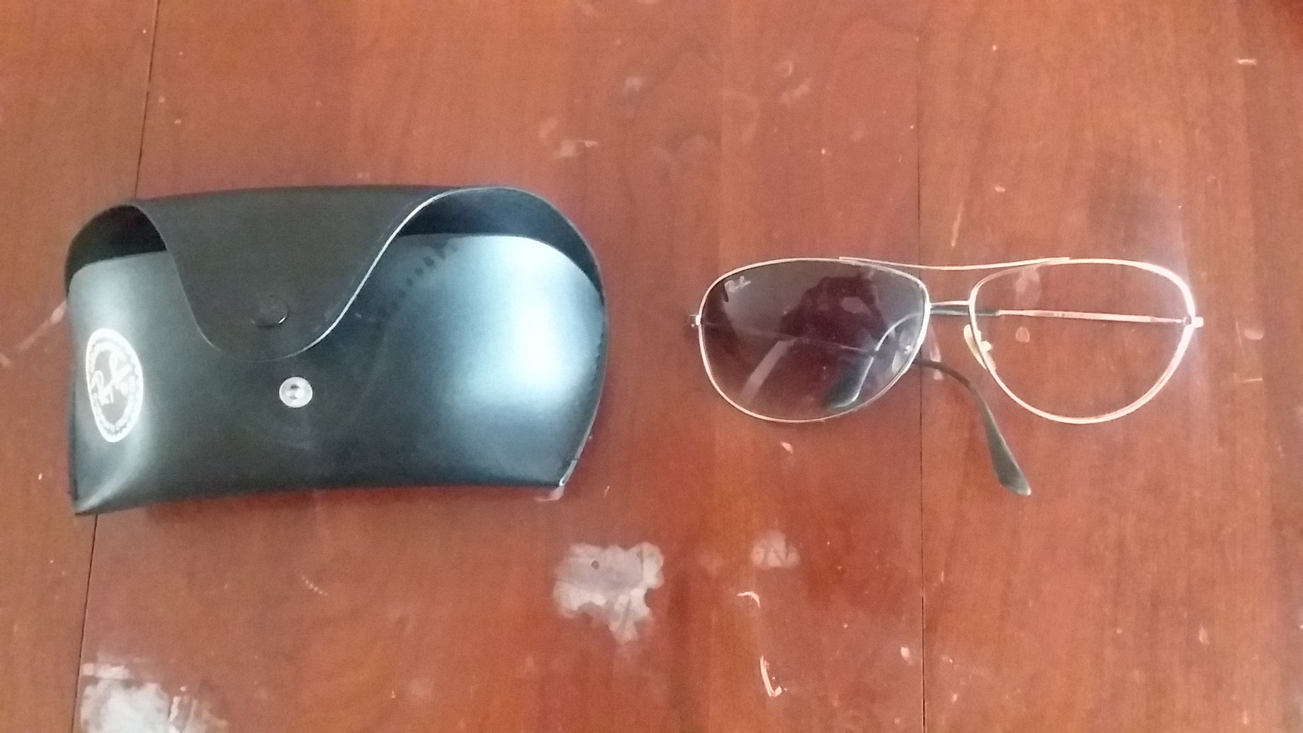 Ray Ban Sunglasses - missing one lens these were bought at nordstroms