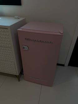 This pink Frigidaire 3.2 Cu. Ft. Retro Mini Fridge