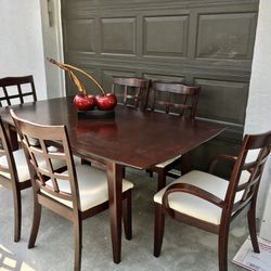 Beautiful Extendable Dining Table With 6 Leather Chairs 