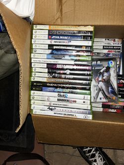 Box of xbox games and more 