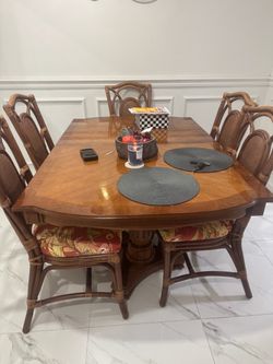 Dinner table with five chairs
