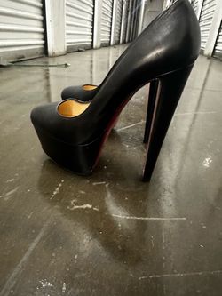 Red bottom black pumps