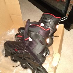 Rollerblades Size 12. $ 55  Black, Red And White. Brand New