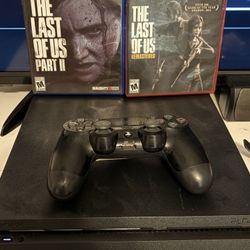 PS4 With Controller And The Last Of Us 1 And 2