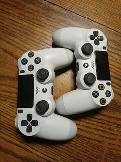 2 Sony DualShock 4 Wireless Controller in the Glacier White color