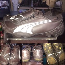 brown-and-white Puma shoes