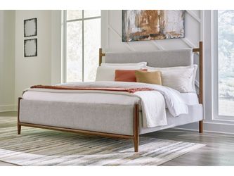 Lyncott Brown California King Upholstered Bed