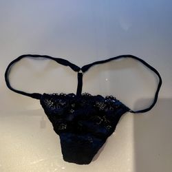 Black Lace Micro-Thong — A Study in Sensual Simplicity