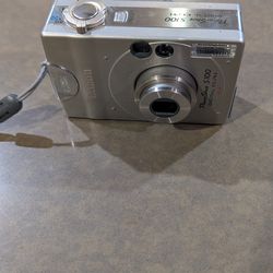 Canon power shot S100 with battery, tested works