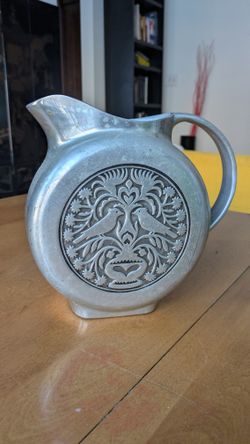 Vintage Pewter Pitcher with Embossed Birds Design