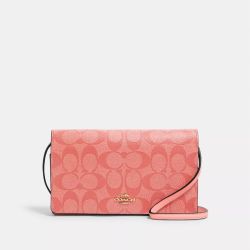 Anna Foldover Clutch Crossbody In Candy Pink Signature Canvas by COACH NEW YORK