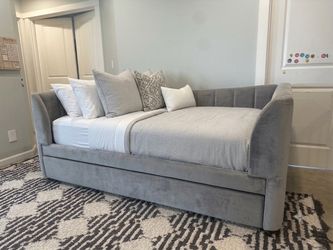 Velvet daybed and mattresses.