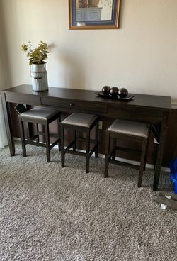 Rokane Brown 4-Piece Counter Table and Bar Stools