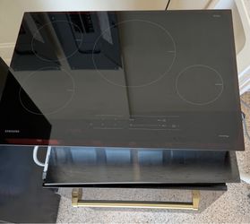 Induction cooktop and over the range microwave